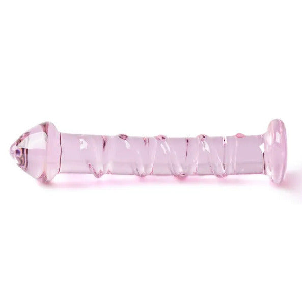 Pink glass object with a textured surface on a white background