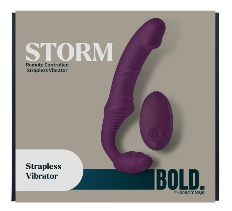 Purple strapless vibrator on a beige background with 'Dream Toys' branding