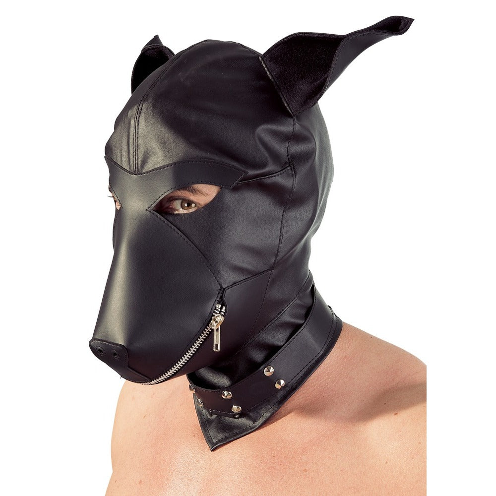 Black leather dog hood worn by a person on a white background