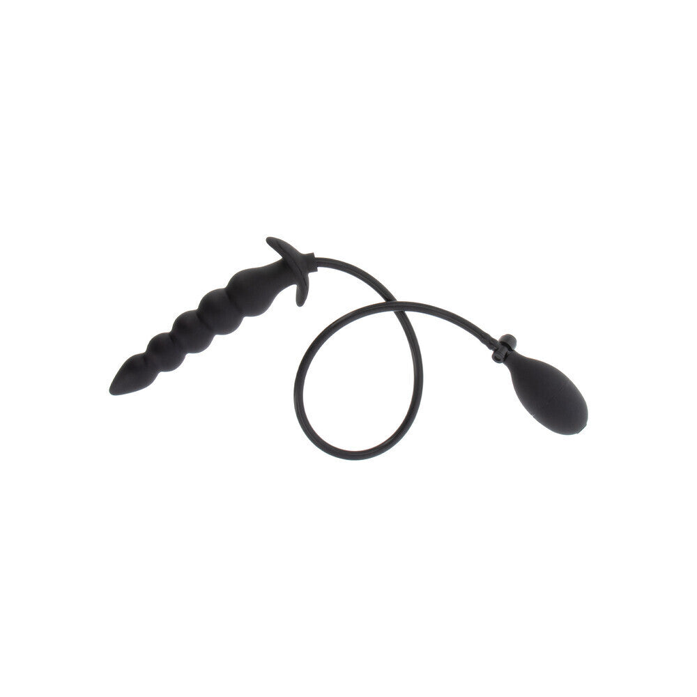 Black silicone butt plug on a white background