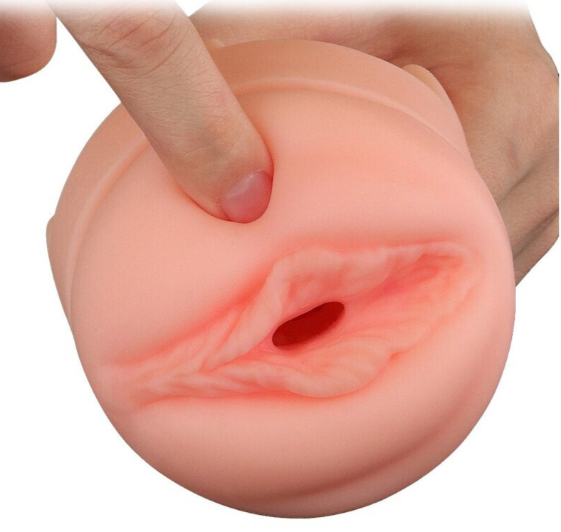 Realistic silicone model of a female reproductive organ with a finger pressing on it, on a white background.