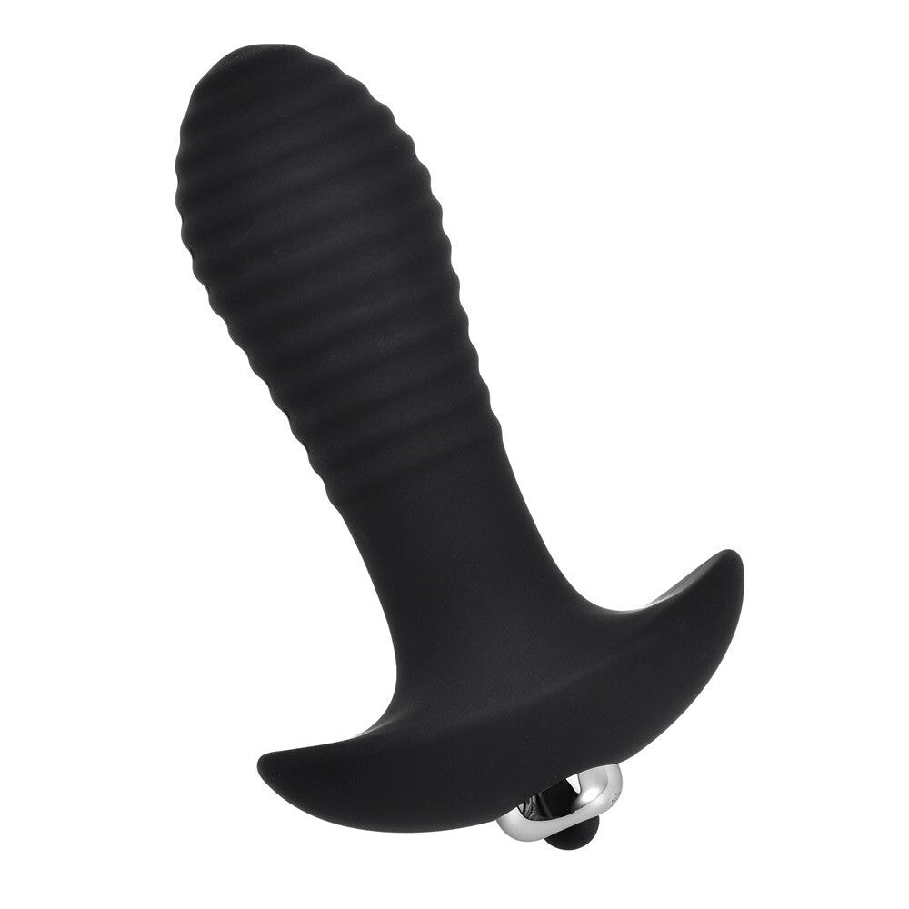Black silicone butt plug on a white background
