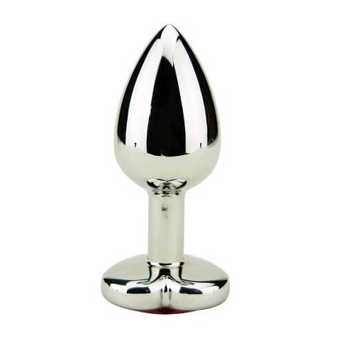 Metallic anal plug on a white background