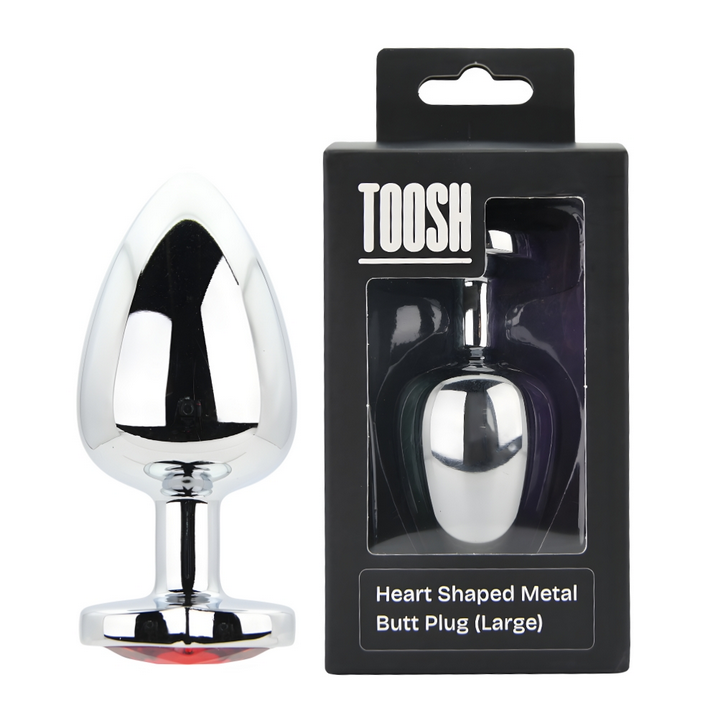 Heart-shaped metal butt plug with packaging displaying 'TOOSH' brand.
