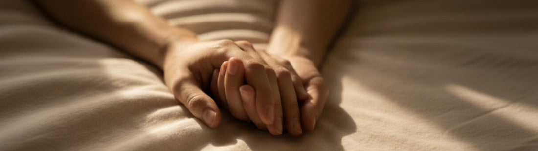 couple holding hands in sensual lighting