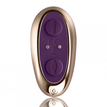 Purple and gold remote control on a white background
