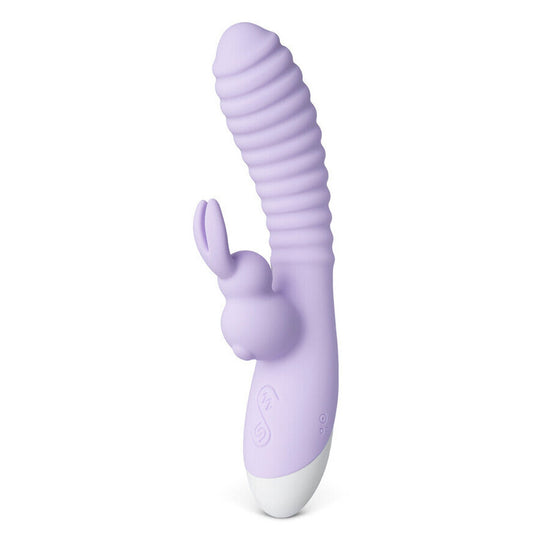 Purple silicone rabbit-shaped sex toy on a white background