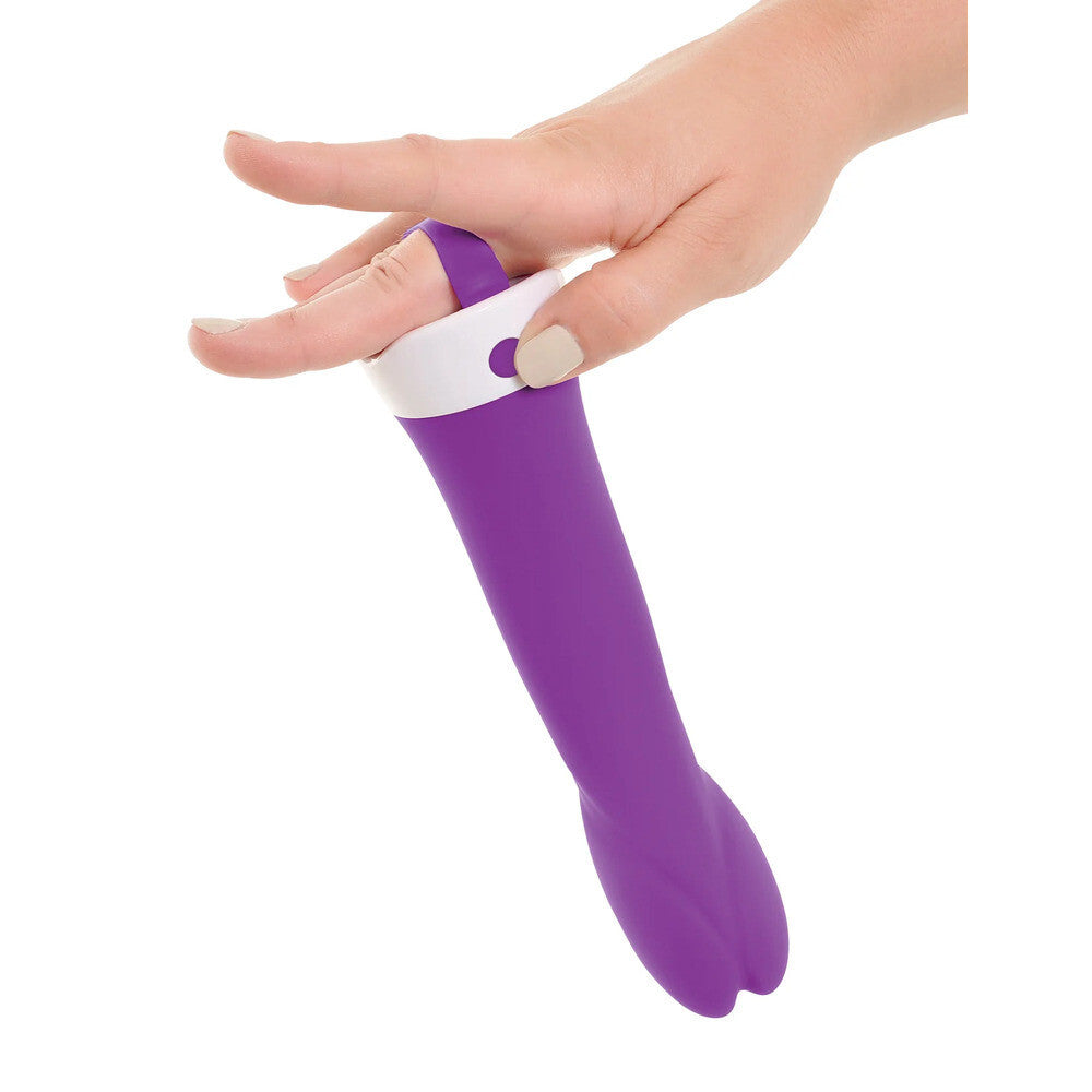 Purple and white device on a person's hand against a white background