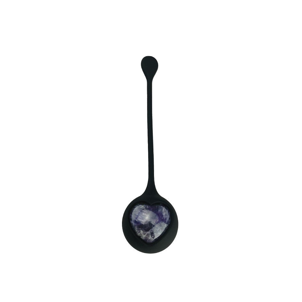 Black gemstone kegel ball on a white background