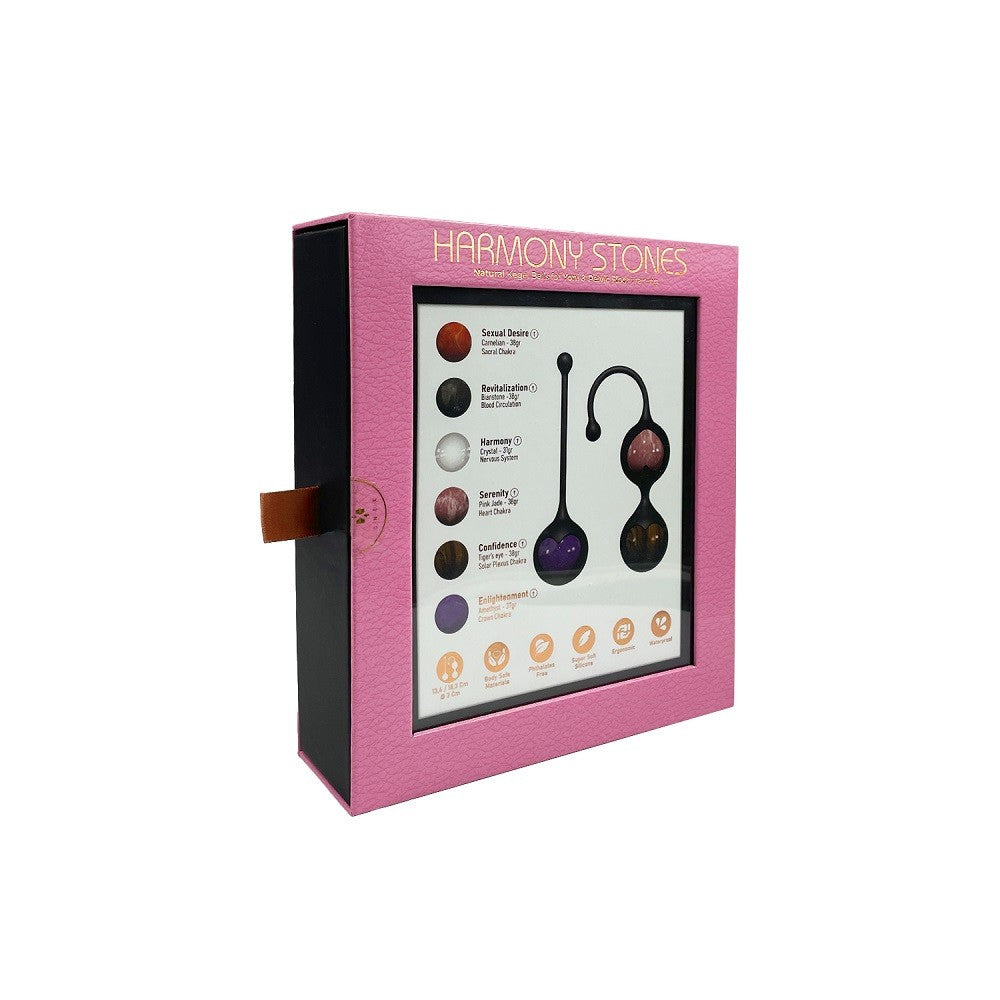Pink box with 'Harmony Stones' branding and product information on a white background
