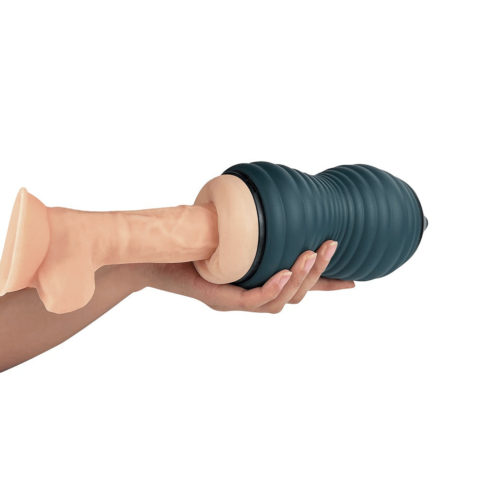 Hand holding a teal massager against a white background