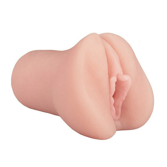 Realistic silicone pussy masturbator on a white background