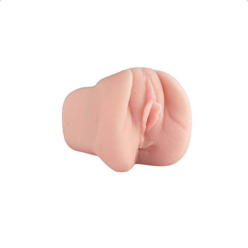 Pink silicone masturbator on a white background