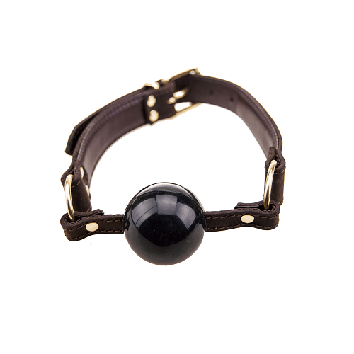 Brown leather collar with a black ball on a white background