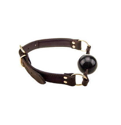 Brown leather collar with a black ball on a white background