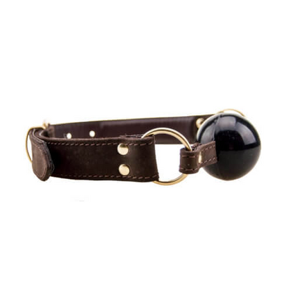 Brown leather collar with a black ball on a white background