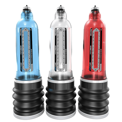 Three cylindrical penis pumps in blue, clear, and red on a white background