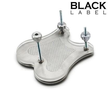 A clear plastic and silver metal ball smasher with three threaded metal rods, shown on a white background with the text 'BLACK LABEL' in the top right corner.