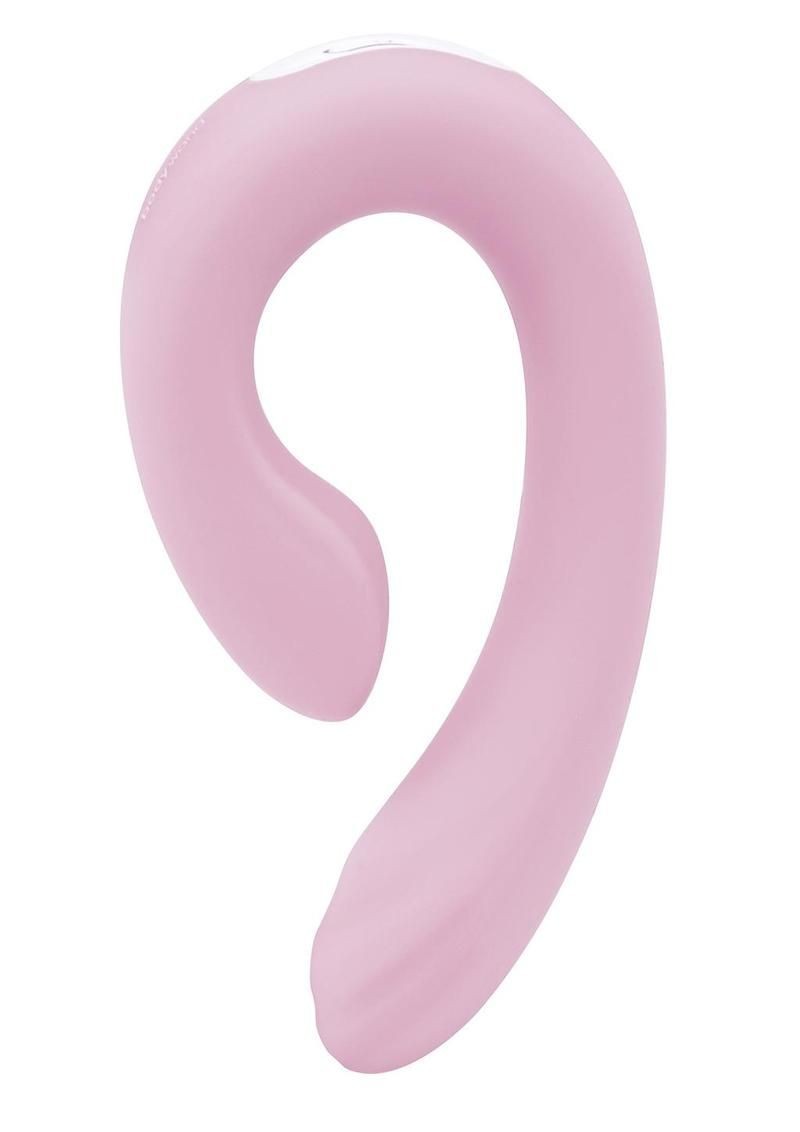Pink vibrator on a white background