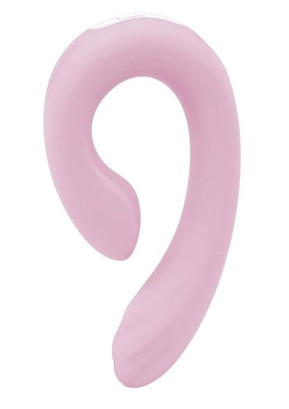 Pink vibrator on a white background