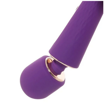 Close-up of a purple and gold wand on a white background
