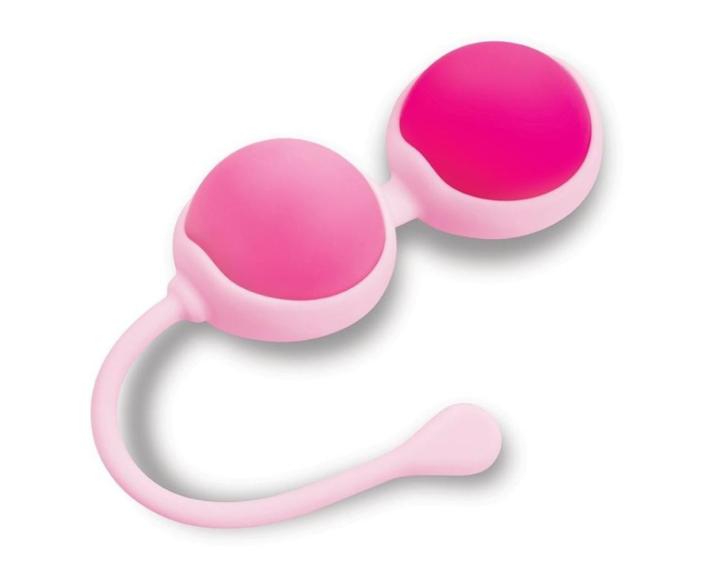 Pink silicone kegel balls on a white background