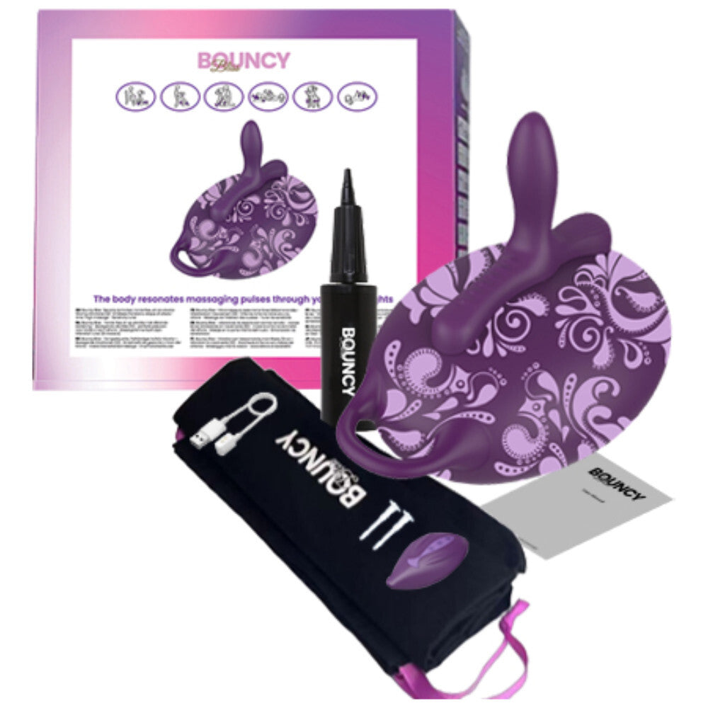 Bouncy product set with packaging, purple device, black carrying case, and pen on a white background.