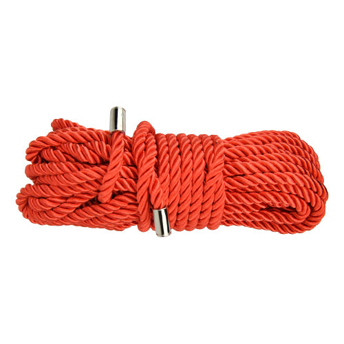 Red bondage rope with a metal clip on a white background