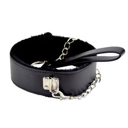 Black handbag with gold chain strap on a white background