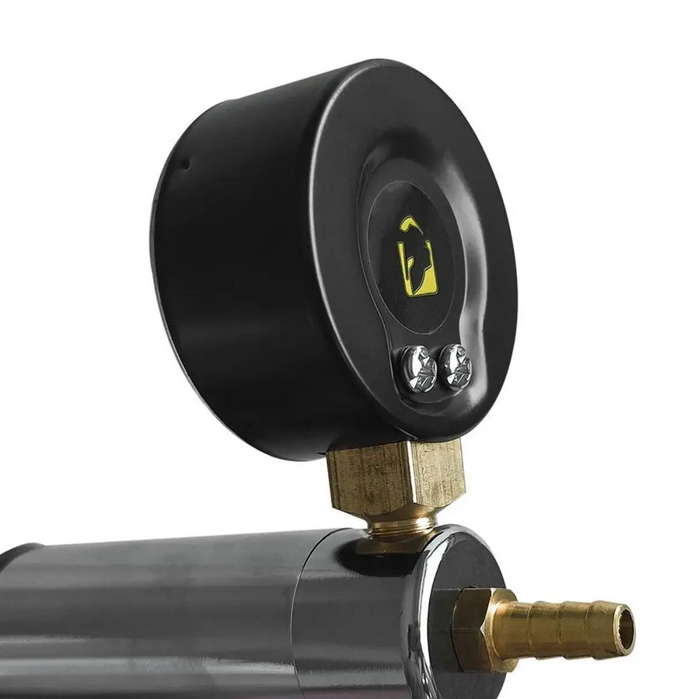 Close-up of a pressure gauge with brass connectors on a white background
