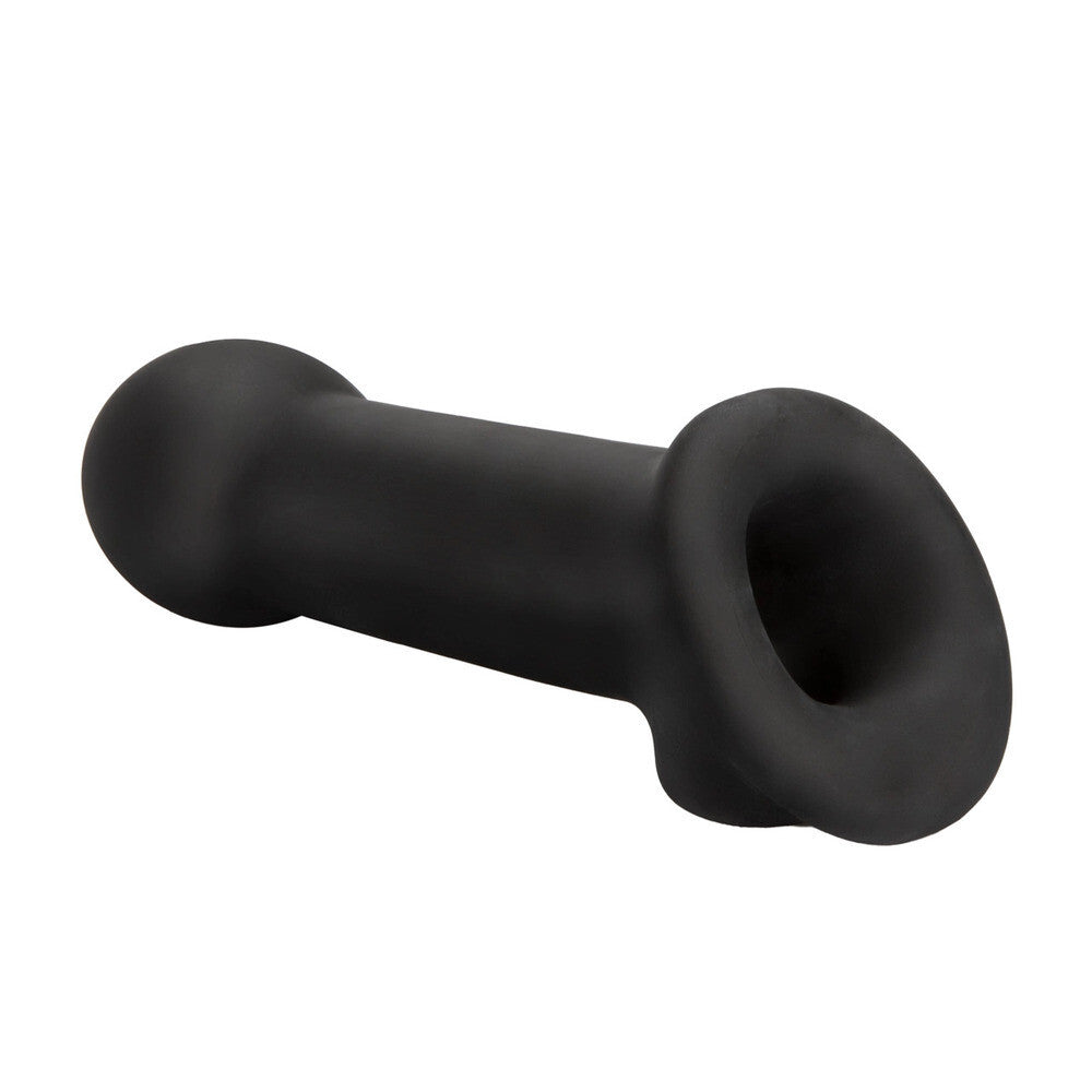 Black silicone sex toy penis extender on a white background