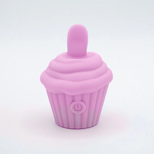 Pink silicone cupcake-shaped vibrator on a light gray background