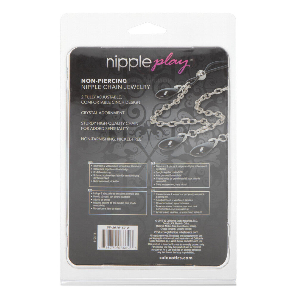 Packaging of nipple chain jewelry with brand name 'Nipple Play' on a white background.