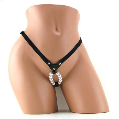 Black g-storng t with pearl accents on a mannequin
