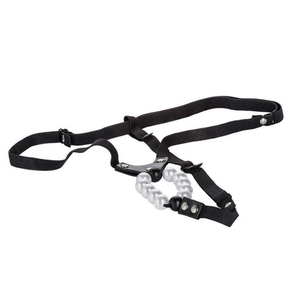 Black harness with pearl-like beads on a white background