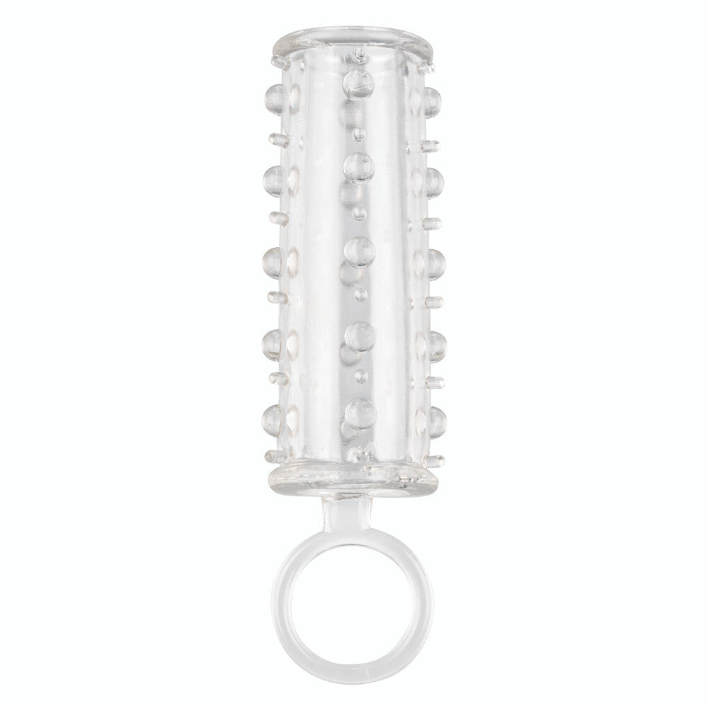 Clear penis sleeve tool with circular base and textured cylindrical top on a white background