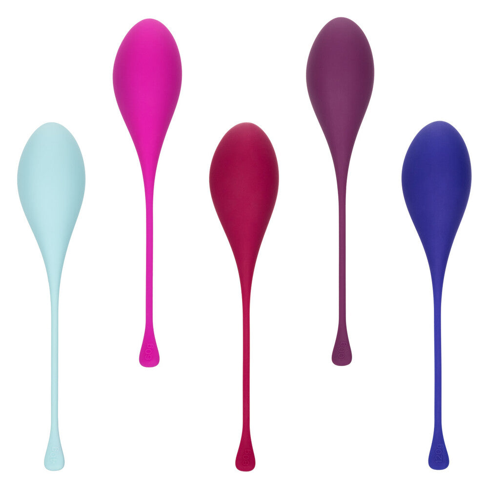 Set of five colorful silicone kegel balls on a white background