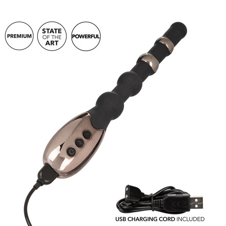 Black and silver device with USB charging cord on a white background