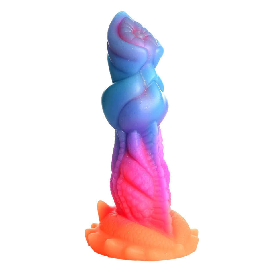 Bright multicoloured dildo on a white background