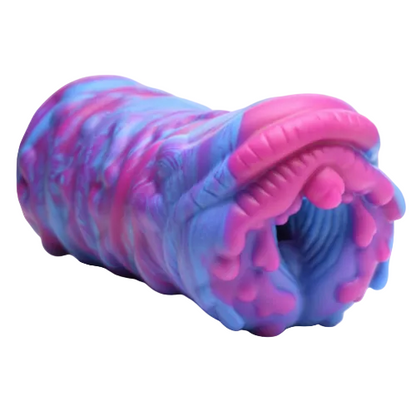 Pink and blue marbled cylindrical masturbator on a white background