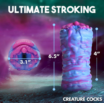 Illustration of a pink and blue creature cock vagina with measurements on a dark background
