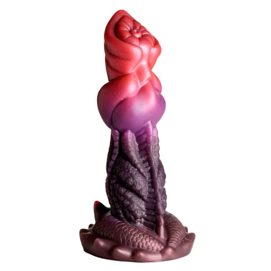 Decorative dildo with a red and purple design on a white background