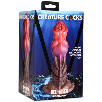 Silicone dildo packaging with 'Creature Cocks' branding on a white background