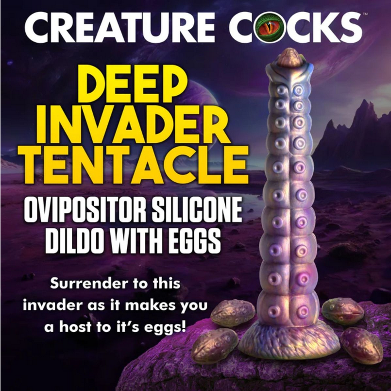 Silicone dildo with tentacle design and text 'Creature Cocks' on a fantasy landscape background.