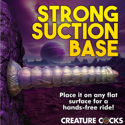 Product advertisement for 'Strong Suction Base' with a purple alien landscape background.