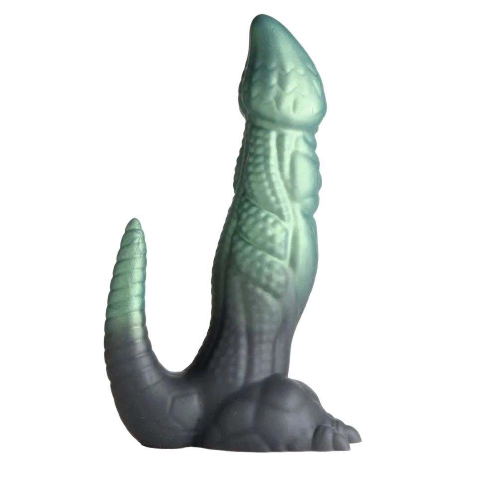 Green and gray dinosaur-like dildo on a white background