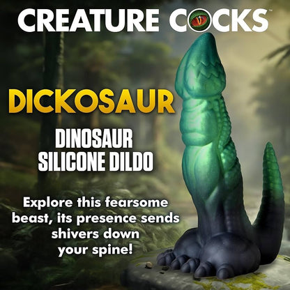 Dinosaur-shaped silicone dildo with 'Creature Cocks' branding and promotional text.