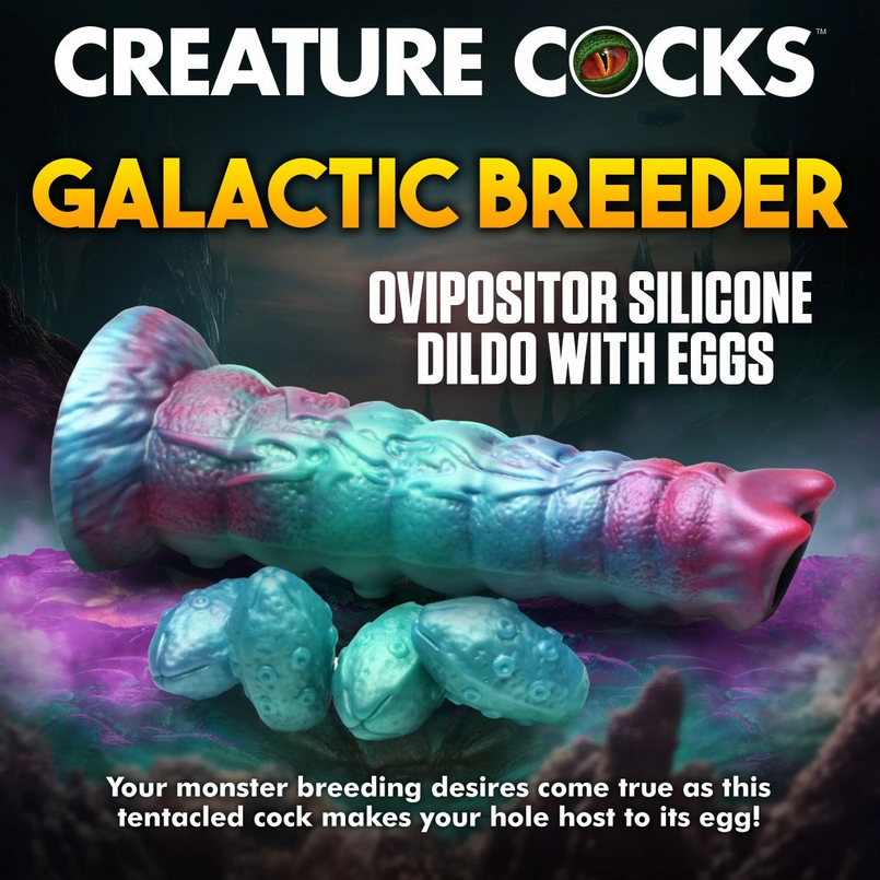 Silicone dildo with eggs labeled 'Galactic Breeder' by Creature Cocks on a dark background.