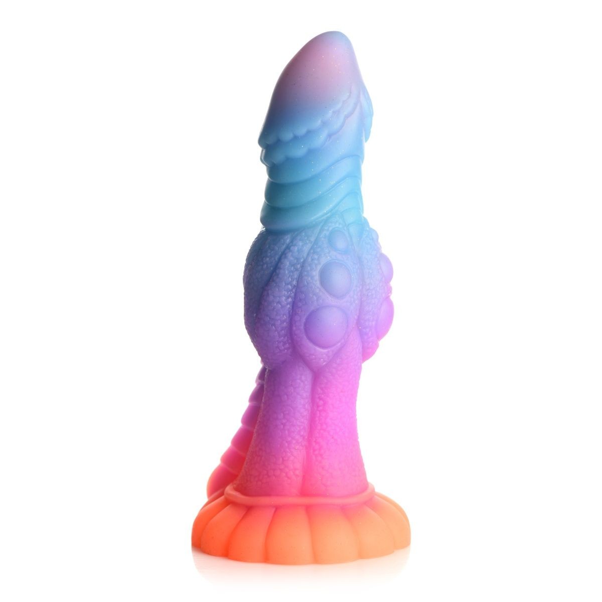 Gradient-colored silicone dildo on a white background