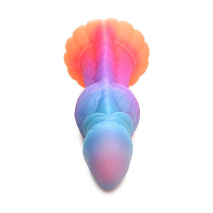 Gradient-colored silicone dildo on a white background